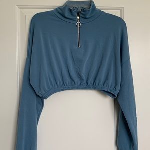 Super cropped blue half-zip sweater